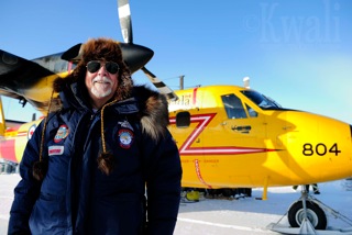 Art standing in front of the Canadian Forces yellow Twin Otter